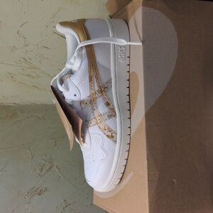 Asics White and Gold Sneakers with Sleek Design